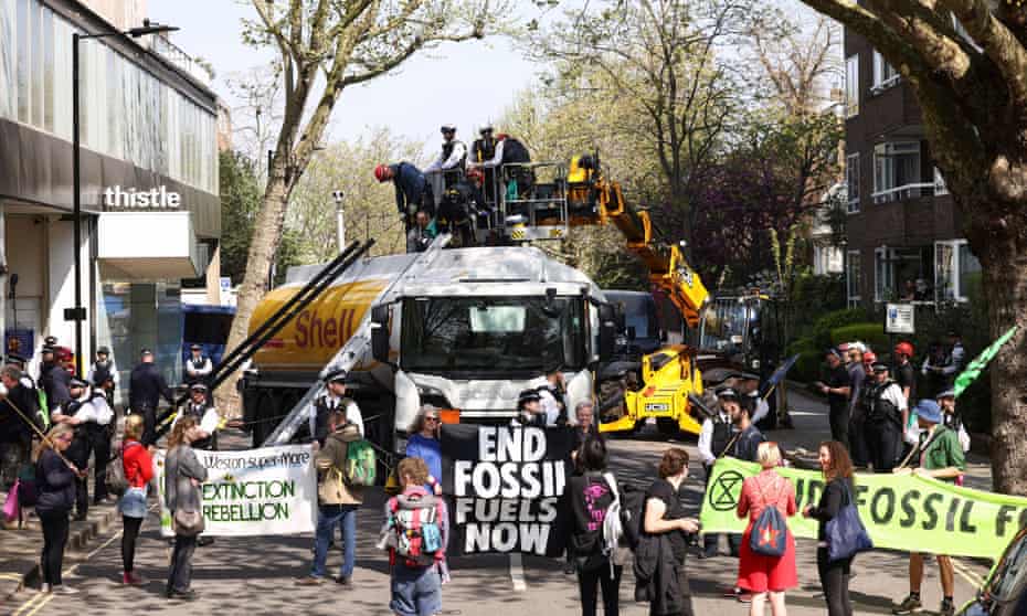 Protesters are removed from an oil tanker