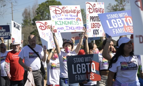 People march at a rally at the Walt Disney Company in Orlando, Florida, on 3 March.