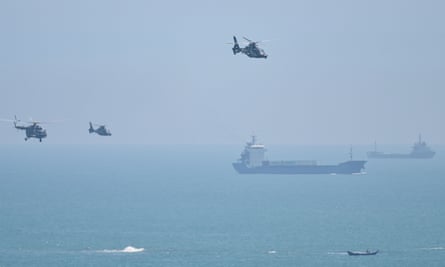 Chinese military helicopters take part in massive military drills following Nancy Pelosi’s visit to Taiwan in 2022.