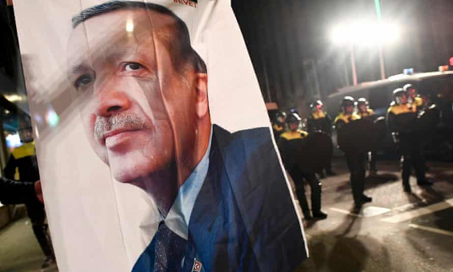 A large image of Turkish President Recep Tayyip Erdogan placed outside the Turkish consulate during protests in Rotterdam, Netherlands.