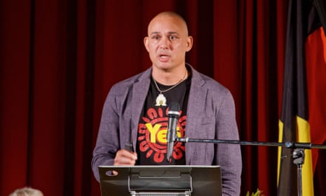 Thomas Mayo speaking on stage