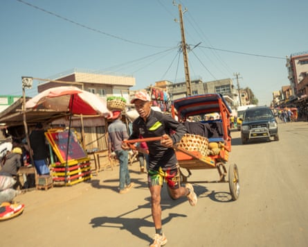 Diry, who has a hand-pulled rickshaw, travels around town in the mornings, mostly transporting goods.