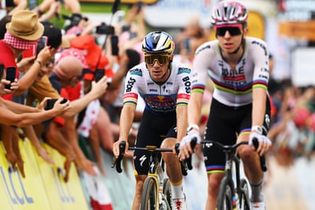 Remco Evenepoel crosses the line at the end of stage five shortly behind Tadej Pogacar