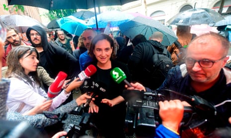Barcelona’s mayor Ada Colau waits outside a polling station in Barcelona earlier.