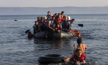 An overcrowded dinghy with refugees