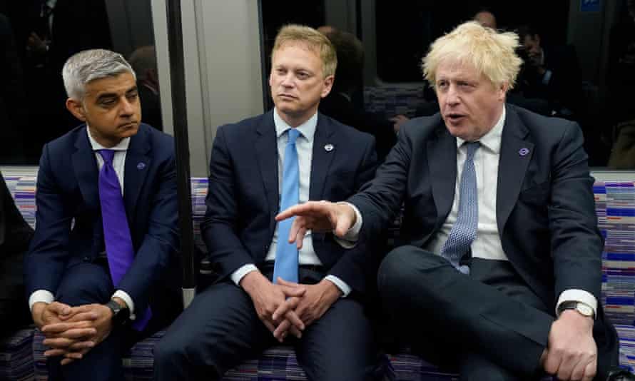 Right to left: Boris Johnson, transport secretary Grant Shapps and London mayor Sadiq Khan on an Elizabeth line train at Paddington station today to mark the completion of London’s Crossrail project.