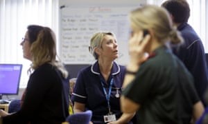 Intermediate care nurse Jackie Goldsmith discusses a patient’s case during a team meeting at Westhaven hospital