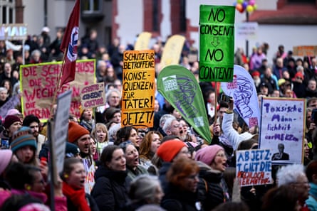 Participants demonstrate with placards with the letterings reading ‘No consent – no content’ and ‘Protection for those affected, consequences for perpetrators! Now!’ in a protest against digital violence in Frankfurt.