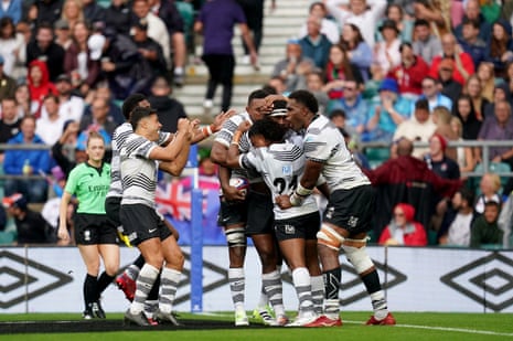 Fiji’s Vinaya Habosi celebrates scoring his sides second try with his team mates during the Summer Nations Series match against England at Twickenham.