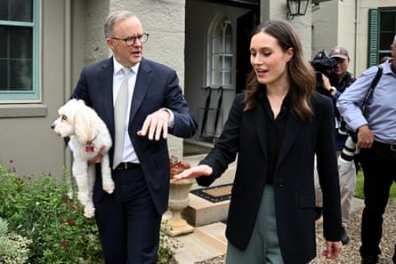 Show dog: Anthony Albanese and his pup Toto with former Finnish prime minister Sanna Marin in December.