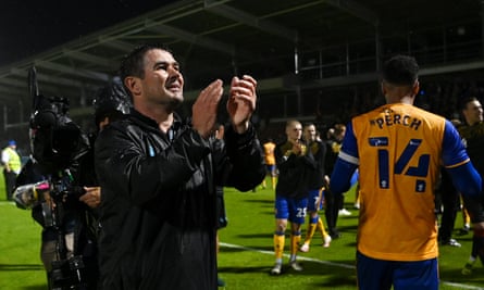 Nigel Clough celebrates after Mansfield’s victory over Northampton