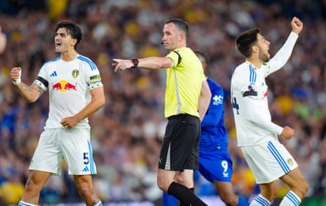 Referee Christopher Kavanagh awards a penalty to Leeds.