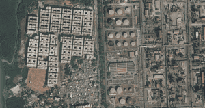 The original Mahul village (bottom left) and the 72 tower blocks (top left), near the area’s oil refineries and heavy industry.