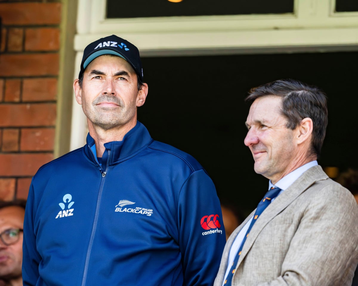Stephen Fleming (left) looks out from the Pavilion at Lord’s before ringing the bell to signal five minutes before the start of play.