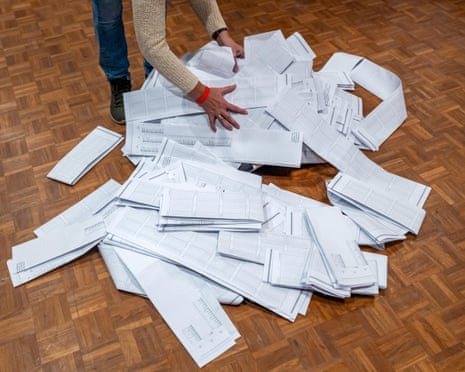 Polling station staff at the World Forum count votes cast by eligible voters on ballots in The Hague, the Netherlands.