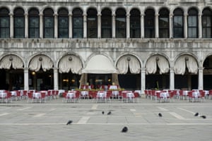 An empty restaurant in a deserted St Mark’s Square, Venice