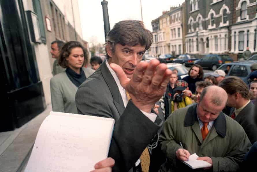 Arsène Wenger holds an impromptu press conference on the steps outside Highbury in 1996.