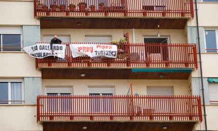 A protest banner on an apartment balcony reads ‘Stop tourist flats’ in Sants, Barcelona, on 19 May 2023.