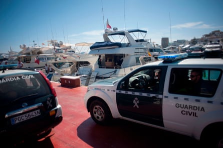 Officers of the Guardia Civil on the docks during a raid targeting the Russian mafia in Puerto Banús in 2017.
