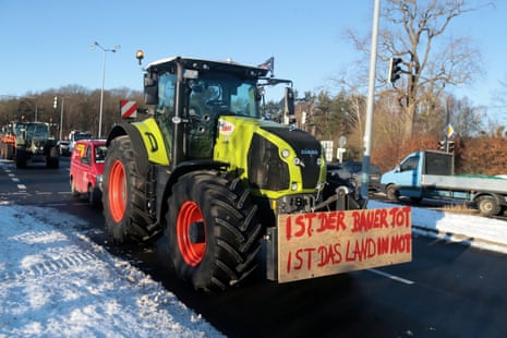 Tractors on a street as German farmers demonstrate during a nationwide farmers' strike, near the German-Polish border in Ramin, Germany, today.