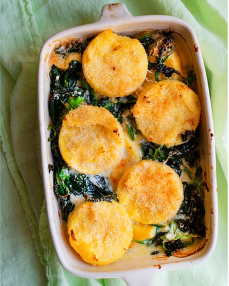‘The evenings are still a bit nippy and I am still bringing out carb-centric suppers’: baked polenta with spinach and gorgonzola.