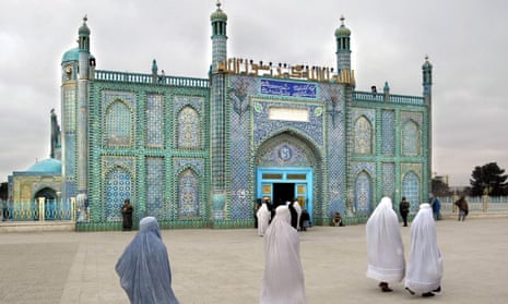 Women dressed in burqas enter the Blue Mosque of Mazar-i-Sharif in Northern Afghanistan, containing the tomb of the great commander of Islam, Amir Ul Momeineen Ali.