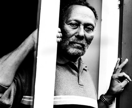Hall leaning in a doorway in black and white image