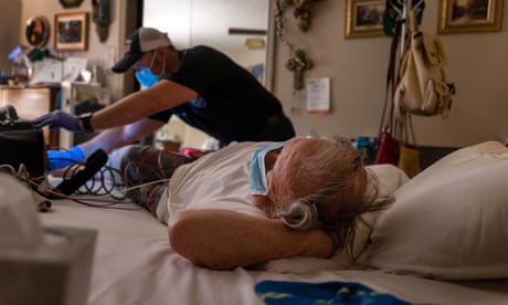 An unvaccinated Covid-positive man, 83, was examined before he was taken to a Houston hospital.