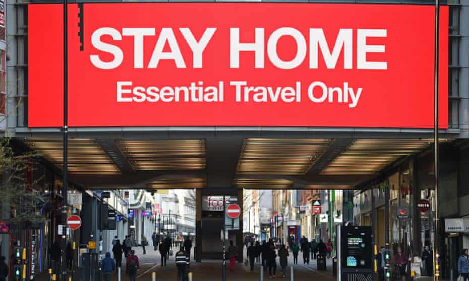 An information board in Manchester asks people to stay home.