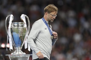 Liverpool’s manager Jurgen Klopp walks past the trophy before the presentation. That’s his sixth successive defeat in a cup final and his second on this stage.