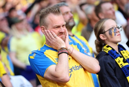 Southampton fans look glum as time runs out in their FA Cup semi-final