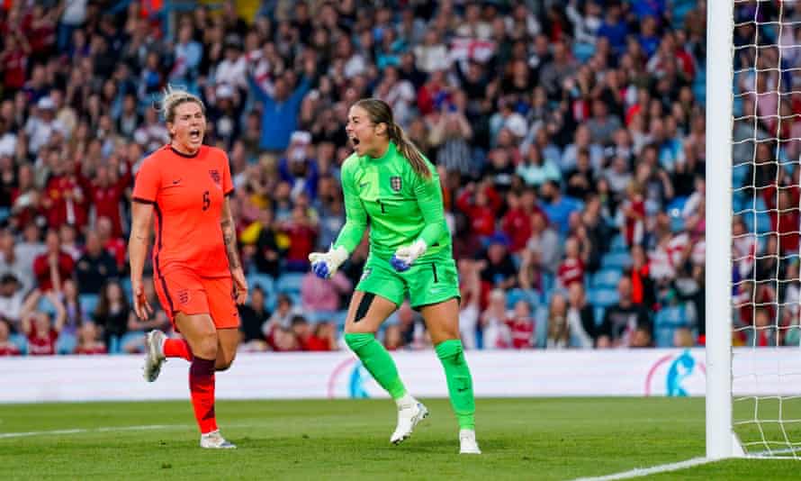 England Women's goalkeeper Mary Earps (right) and Mille Bright celebrate after Dutch Women's midfielder Sherida Spitse (8) failed to convert her penalty.