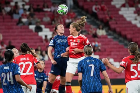 Arsenal's Lotte Wubben-Moy (centre left) goes up for a header with Benfica's Caroline Moller.