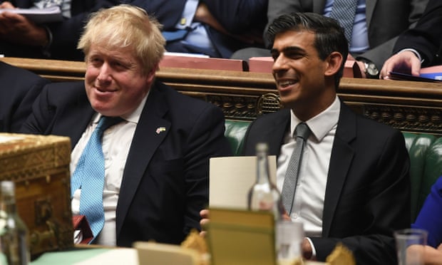 Boris Johnson and Rishi Sunak are seen in the House of Commons