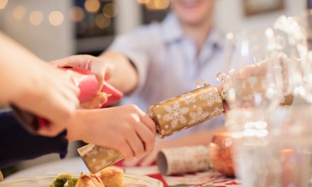 Family pulls crackers over Christmas dinner