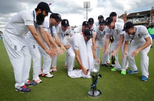 Alistair Cook and the rest of the England team celebrate with the Ashes urn