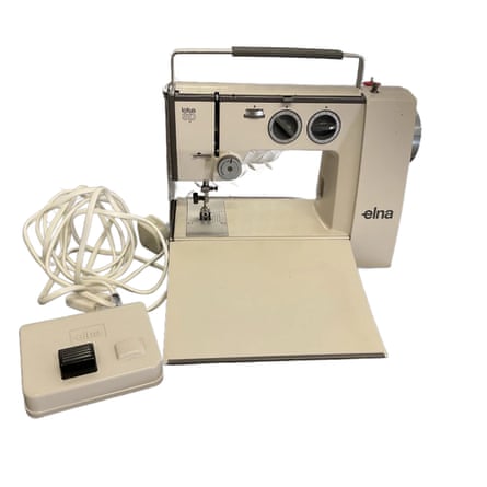 A vintage Elna Lotus SP Sewing Machine and pedal.