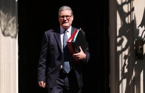 British prime minister, Keir Starmer, departs 10 Downing Street wearing a suit and holding a folder