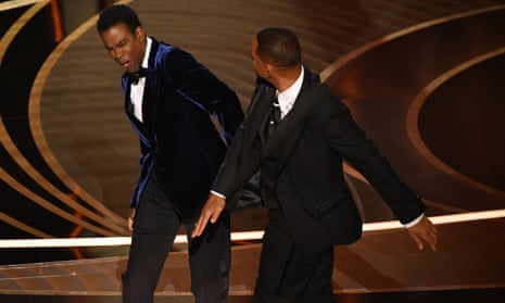 US actor Will Smith slaps Chris Rock onstage during the 94th Oscars ceremony in California.