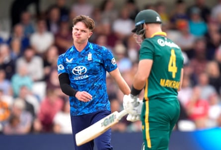 England’s Sonny Baker (left) reacts aft South Africa’s Aiden Markram reaches 50