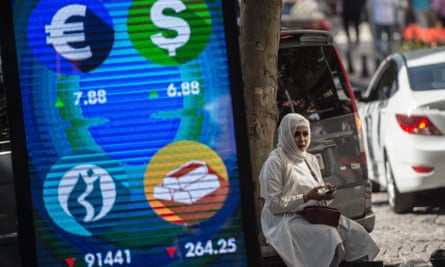 A digital billboard displaying financial information in Istanbul.