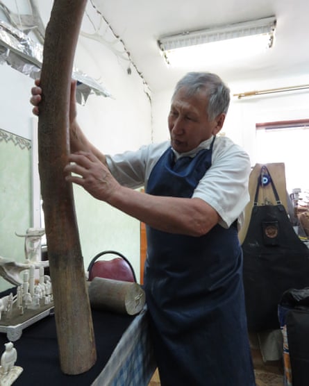 Fedor Markov with a rare mammoth tusk in his studio.