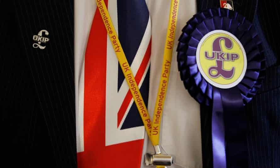 A Ukip delegate wears badges and a Union flag tie at the party’s annual conference in central London.
