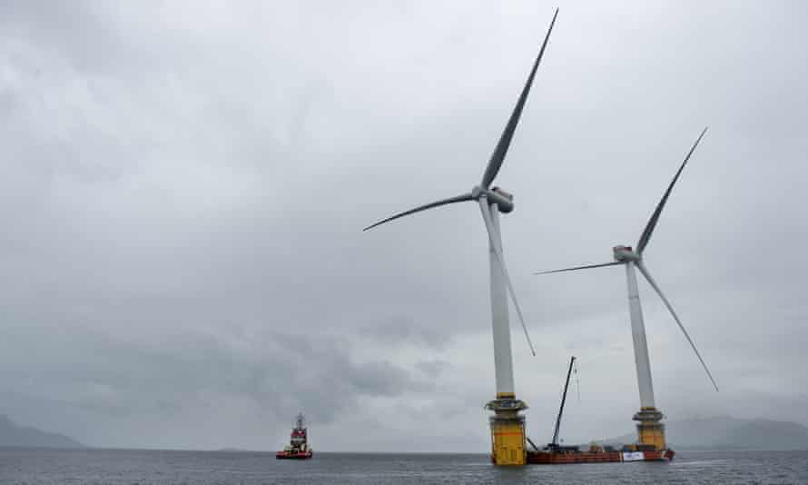 Barges tow wind turbines