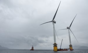 Two of the floating turbines are readied off the coast of Norway for the trip to Scotland.