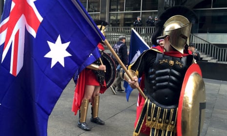 Protesters dressed in costume and carrying Australian flags attend a Reclaim Australia protest in Sydney on 19 July. 