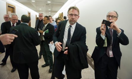 Quick exit: Backpage CEO Carl Ferrer leaves the Senate Homeland Security and Governmental Affairs subcommittee hearing after invoking his Fifth Amendment right against self-incrimination.