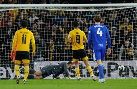 Wolverhampton Wanderers' Raul Jimenez scores their first goal from the penalty spot.