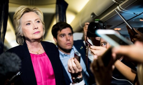 Cabin pressure … Hillary Clinton takes questions on board her campaign plane in 2016.