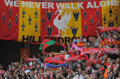 Liverpool football club supporters sing You'll Never Walk Alone during a memorial service to mark the 20th anniversary of the Hillsborough disaster at Anfield in Liverpool on April 15 2009.